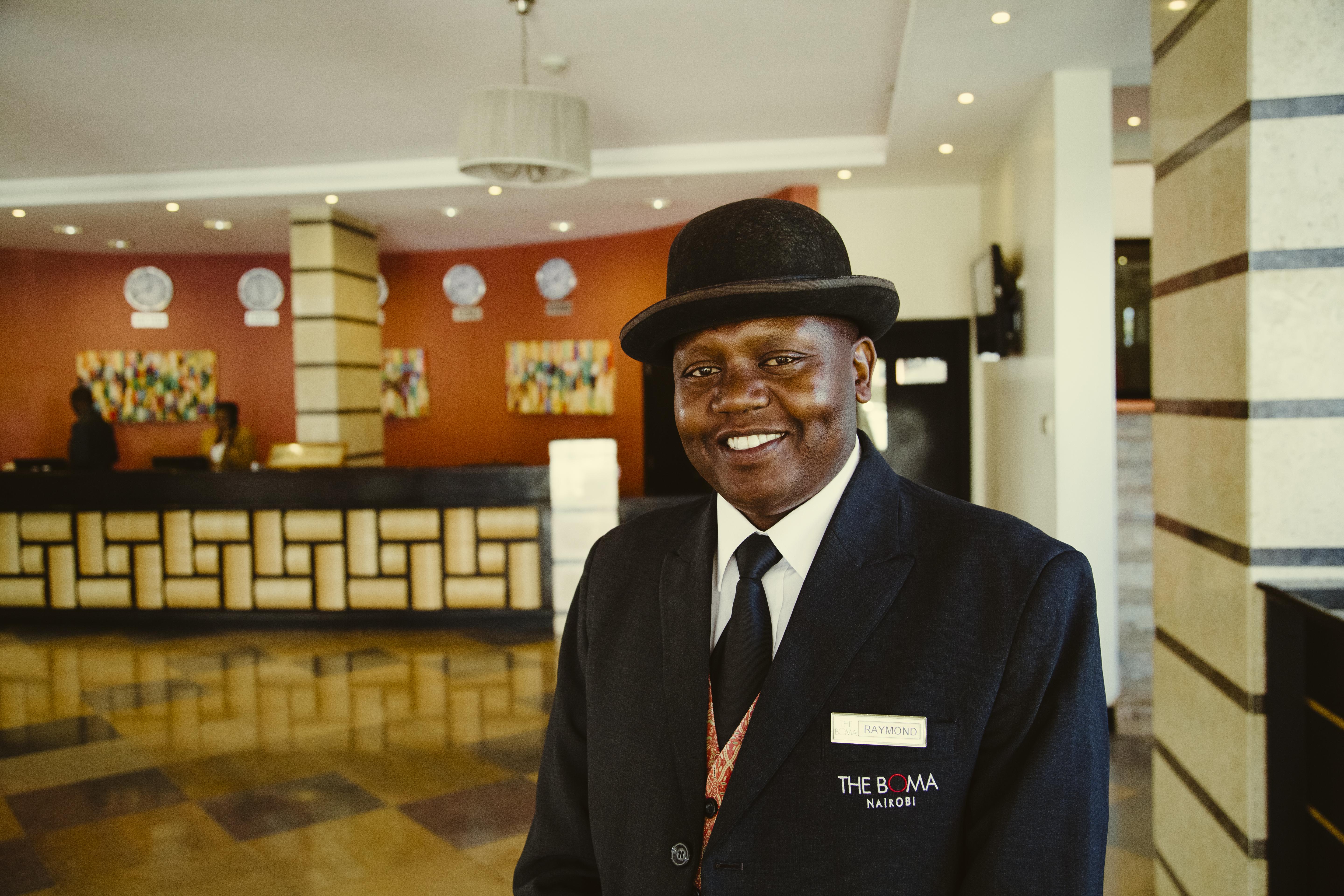 The Boma Nairobi Hotel Exterior photo A hotel concierge